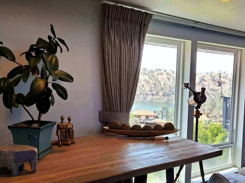 The dining area by the window at the residence