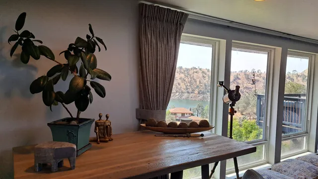 The dining area by the window at the residence