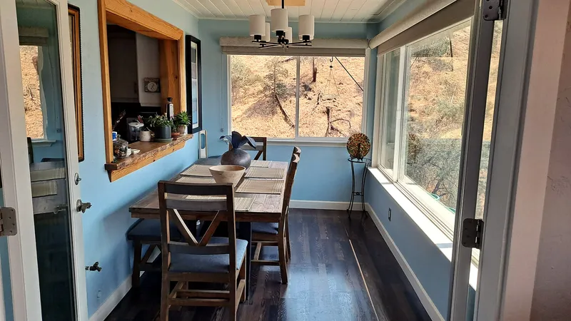 Sunlit breakfast nook used for quiet conversations and one-on-one sessions
